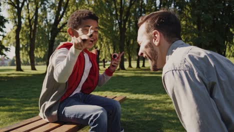 father and son in the park