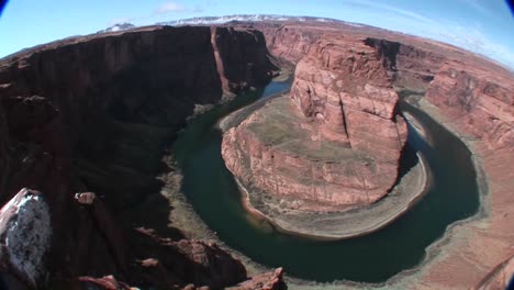 a slow pan across a horseshoe bend in a river