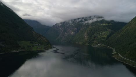 Aerial-Flyover-of-the-Geirangerfjord-with-Mysterious-Skies