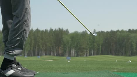 golfer standing on the putting green