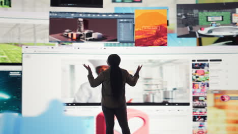 Woman embraces abundance of video content displayed on digital wall dashboard