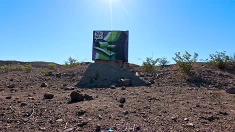 desert graffiti art: colorful mural on electrical box