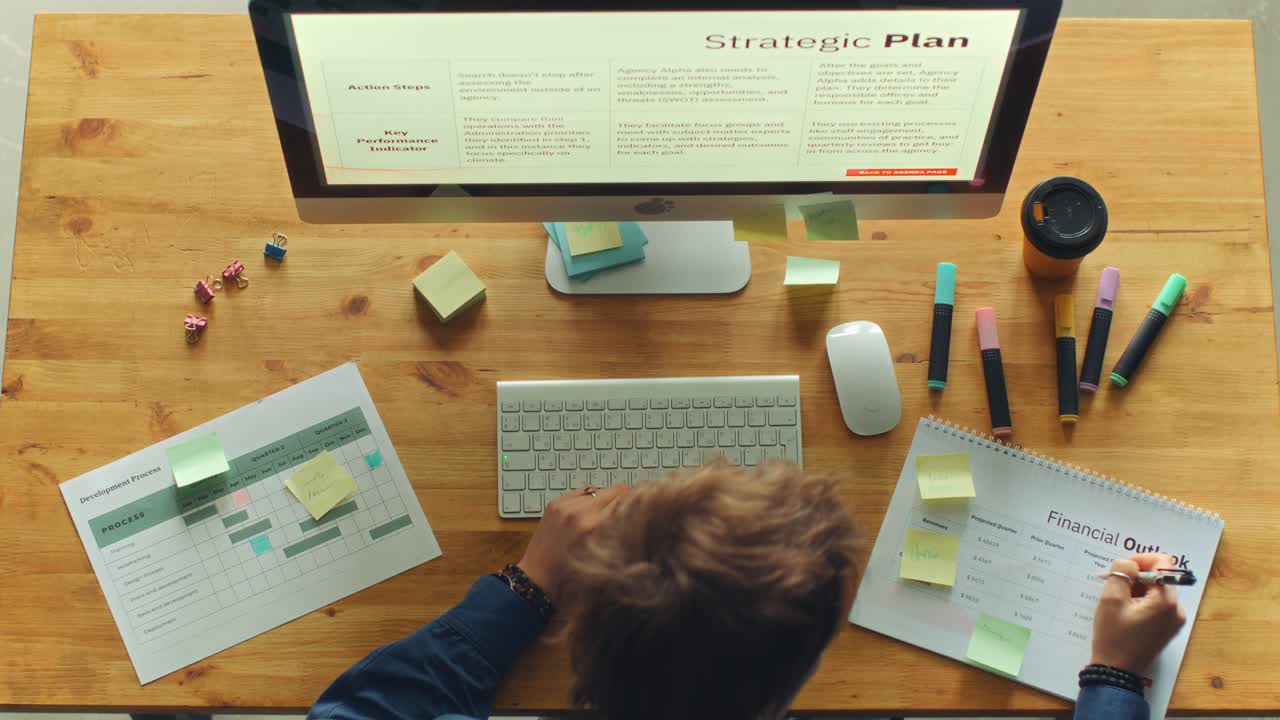 Time Lapse of Businesswoman Working with Computer and Papers at Office Desk