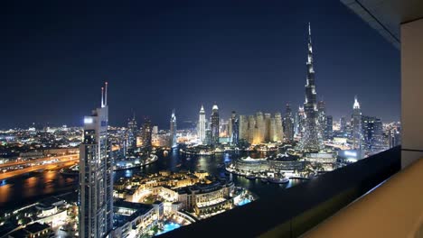 stunning dubai city skyline at night from a balcony