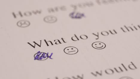 Pen-Marking-A-Happy-Smiley-Face-In-The-Answer-Sheet