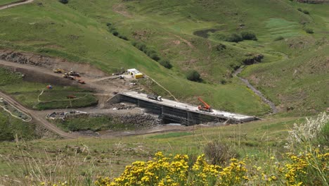 industrial construction of bridge near polihali dam in green lesotho africa valley