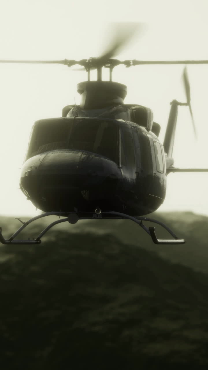 Flying over rugged terrain with a helicopter at dusk