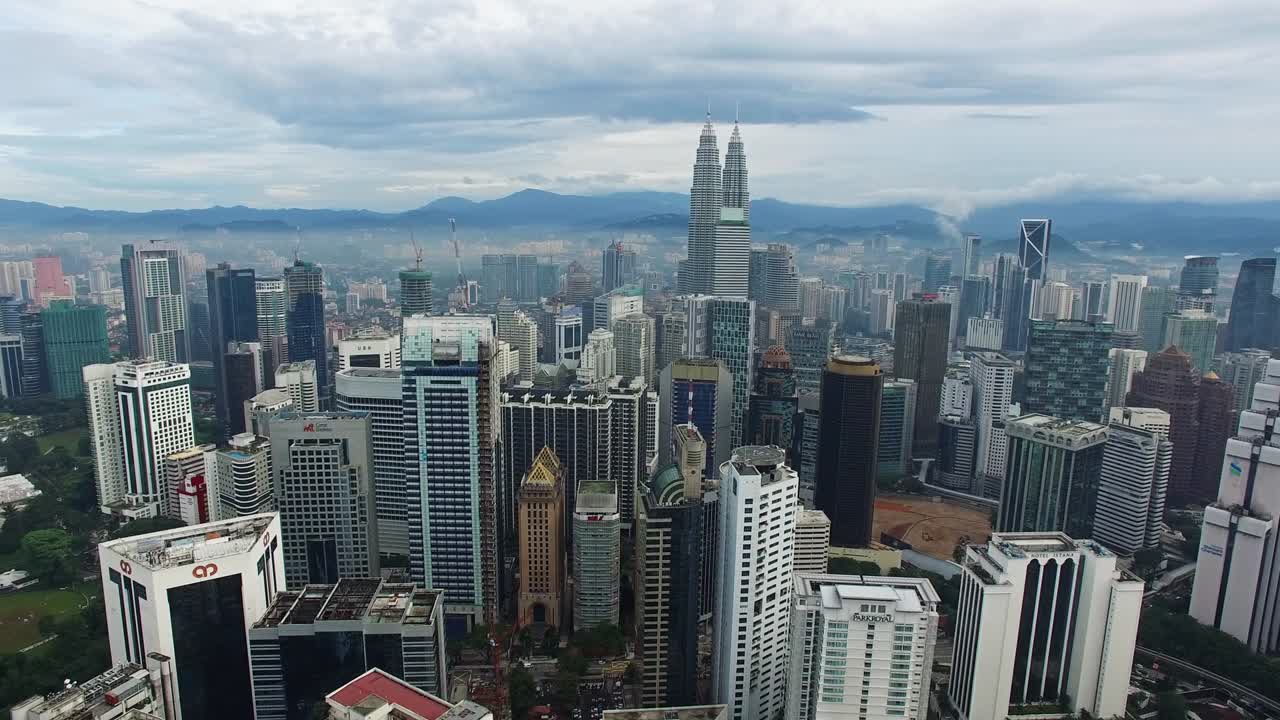 Aerial view of Kuala Lumpur city in Malaysia capital, tall buildings.