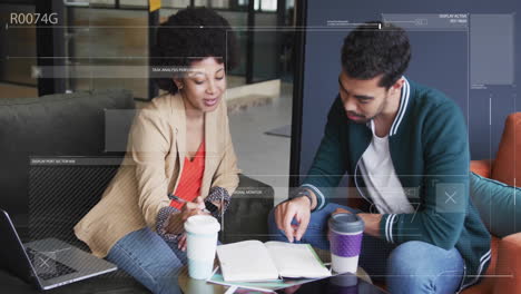 Animation-of-data-processing-and-digital-screens-over-diverse-colleagues-discussing-work-in-office