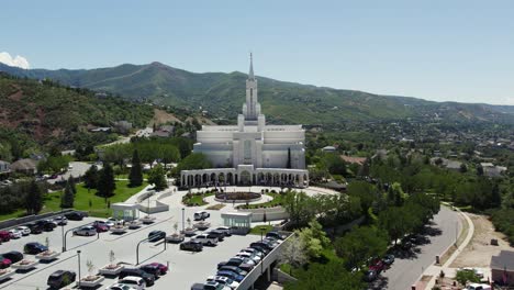 Bountiful-LDS-Mormon-Temple-in-Utah's-Wasatch-Mountains-on-Sunny-Summer-Day,-Aerial-Drone