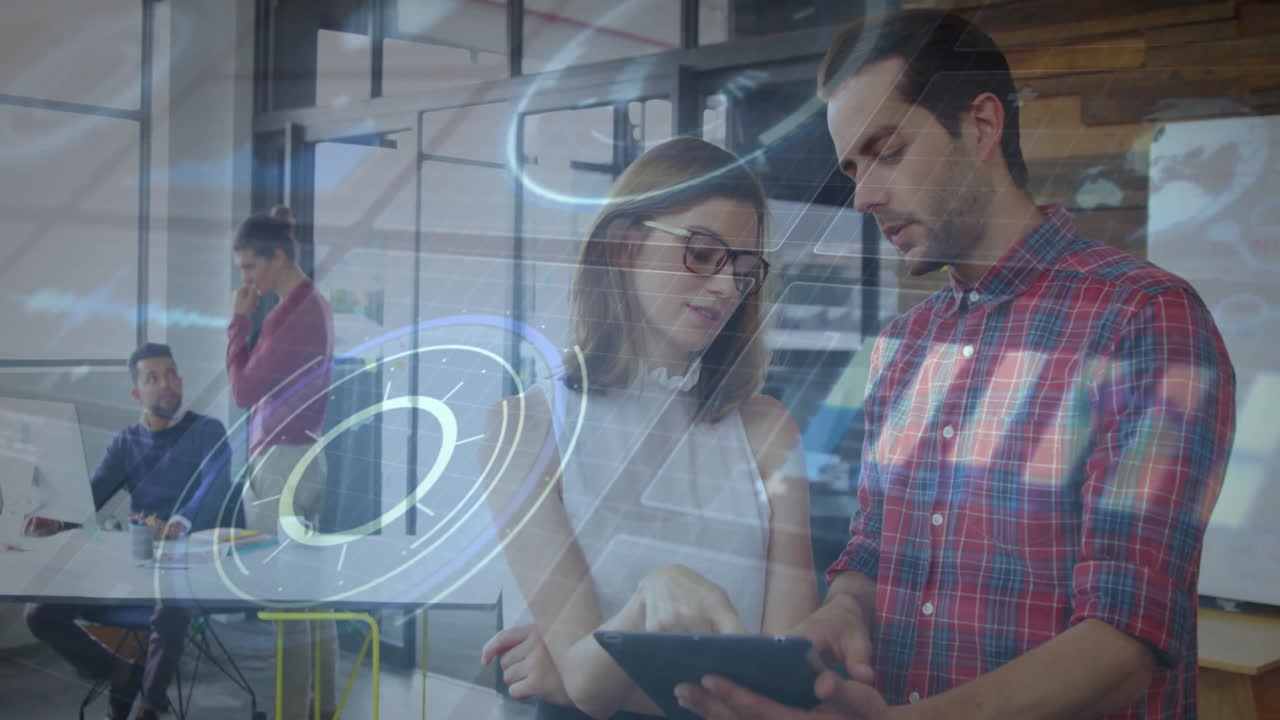 Discussing tablet data, business professionals using futuristic digital animation overlay