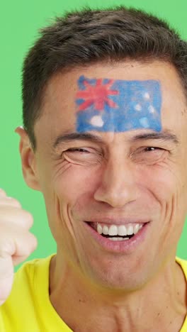 close up of a man supporting australian team
