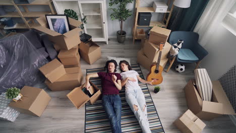 couple relaxing during house move