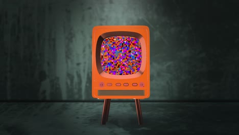 retro orange tv with green screen and static