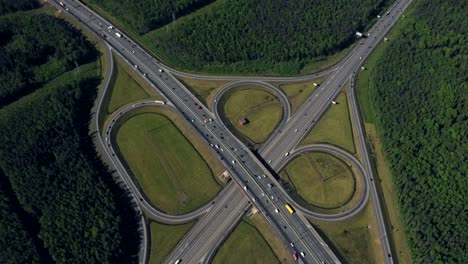 aerial. road traffic in city at summer time.