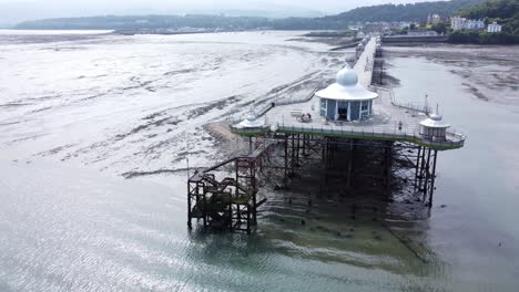 bangor garth pier victorian ornamental silver dome pavilion landmark tourist aerial view low tide right orbit