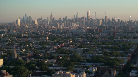 aerial view of the new york city skyline at sunrise. shot in brooklyn