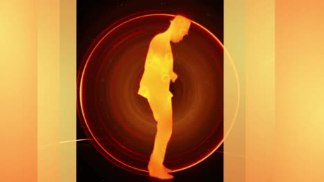 animation of yellow man silhouette dancing with orange circles and yellow stripes in the background