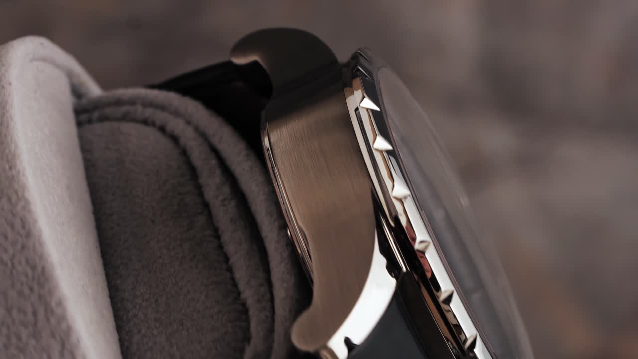 Premium wristwatch spinning on a display turntable, showcasing elegance and design