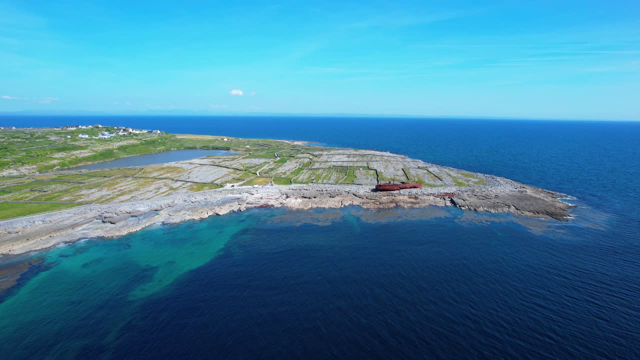 Drone landscape Inisheer shipwreck on beach rusting away aran Islands Ireland