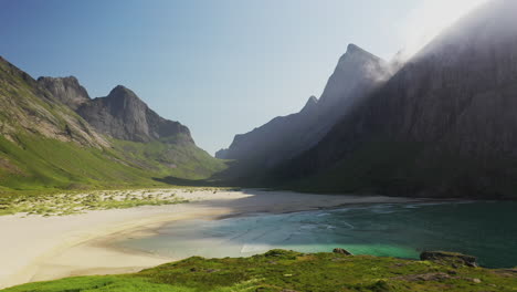 Rotating-drone-shot-of-Horseid-Beach-with-turquoise-blue-water-and-private-beach