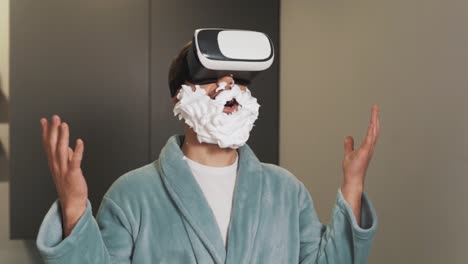 portrait of a man wearing virtual reality glasses with a fake beard made of shaving foam