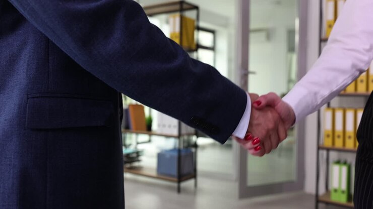 Business Handshake in Office Environment