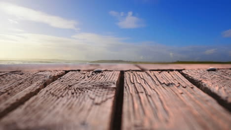 wooden deck with a view of blue skies