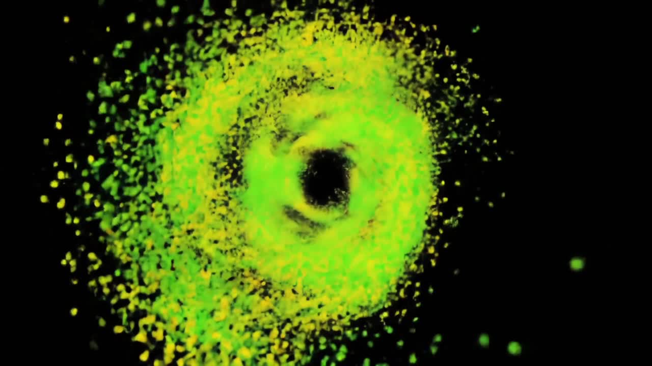 Mesmerizing Spiral Animation Showcasing Vibrant Green and Yellow Particle Dynamics in a Cosmic Vortex Illustration