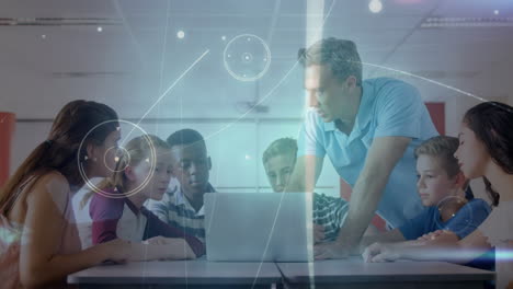 animation of connections over caucasian male teacher and class of diverse pupils with laptop