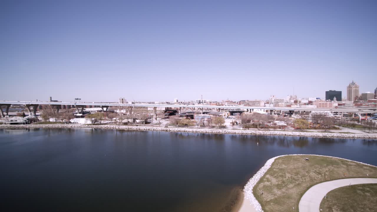Drone Aerial view of freeway traffic from 794 to downtown Milwaukee