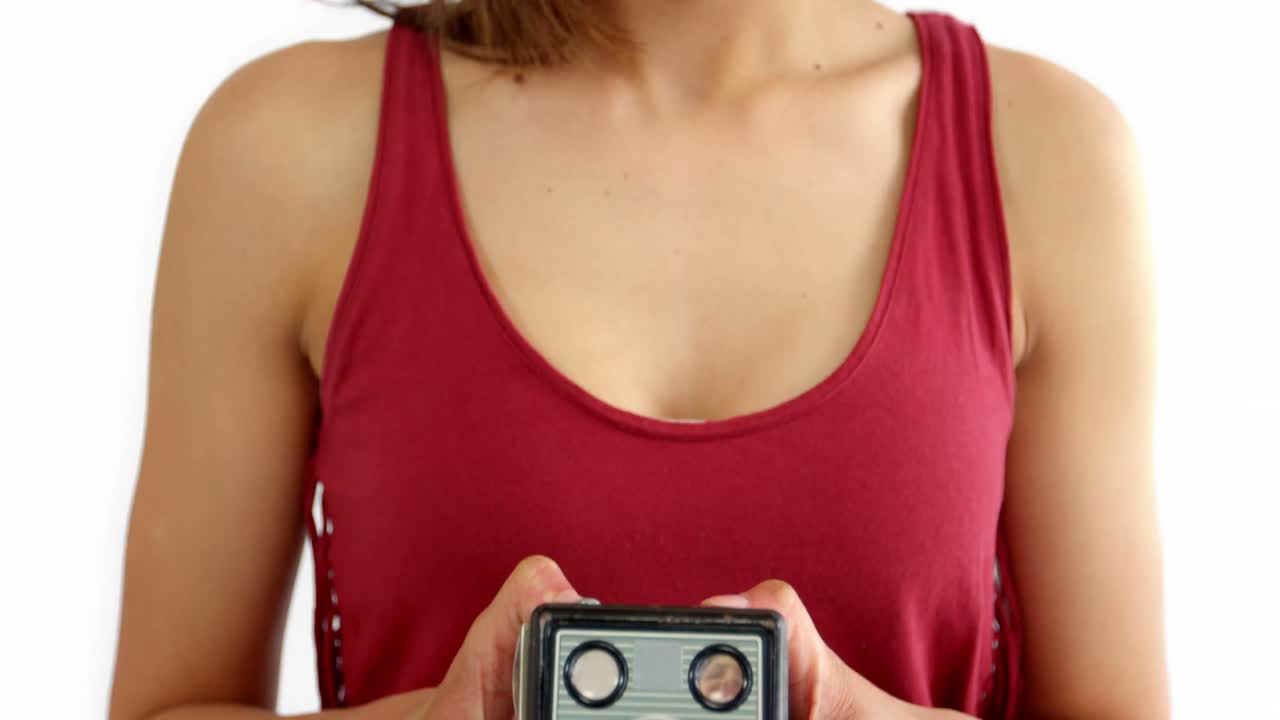 Photographer taking photo with vintage camera