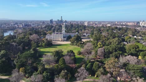 aerial of government house melbourne set within expansive inner city parklands
