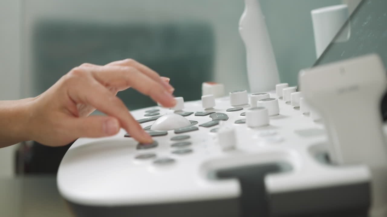 Woman Operating an Ultrasound Machine