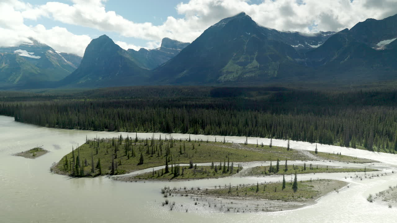 Stunning views from Goats and Glacier Lookout, showcasing rugged peaks, a river and glaciers in the Canadian Rockies