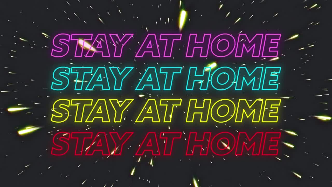 animación de cuatro líneas de coloridas palabras de neón quedarse en casa sobre un fondo negro