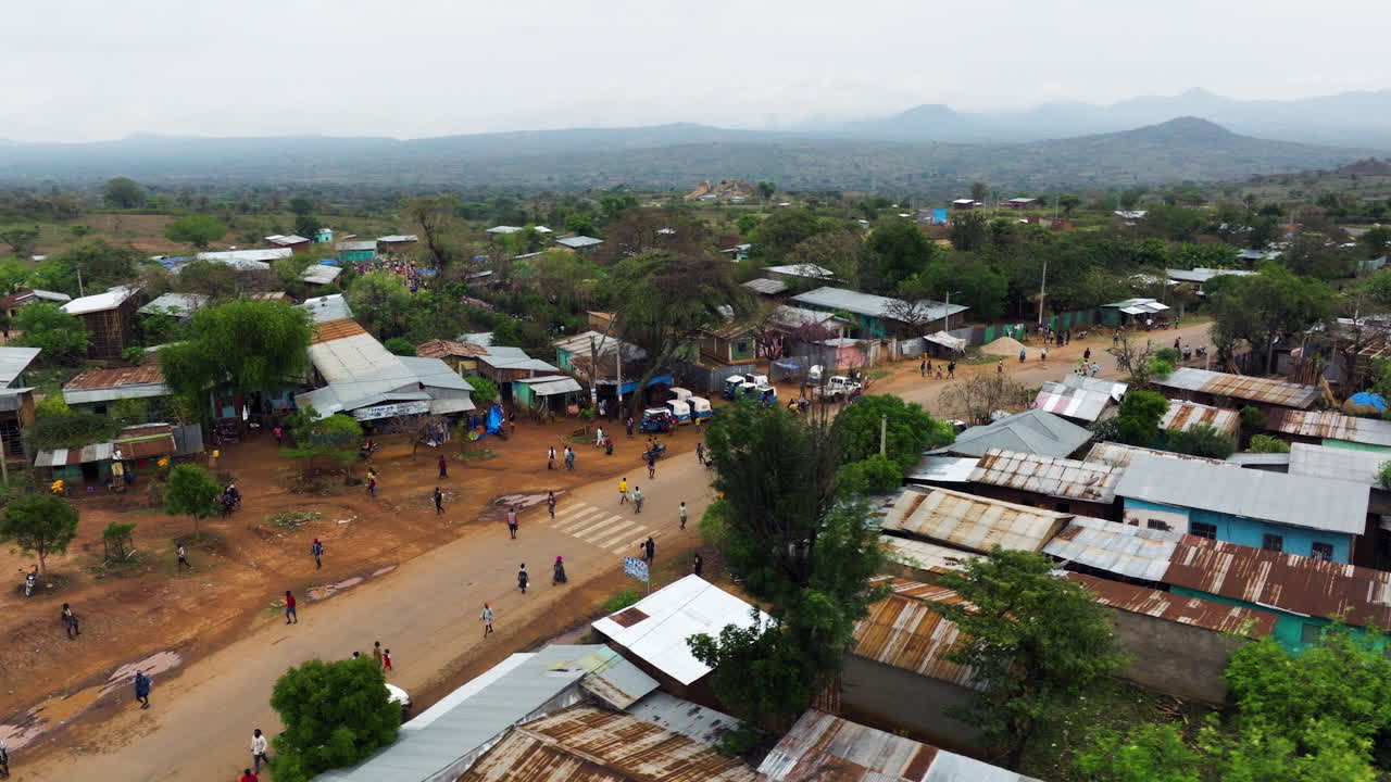 Drone view above colorful tribal market in Omo Valley