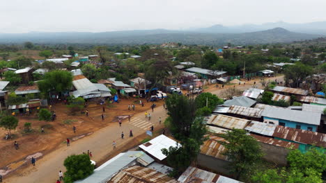 drone view above colorful tribal market in omo valley