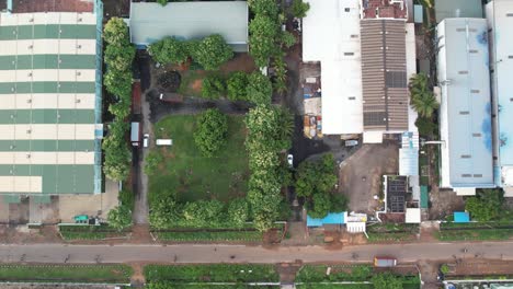 aerial video of warehouse and factory in a country side of asia