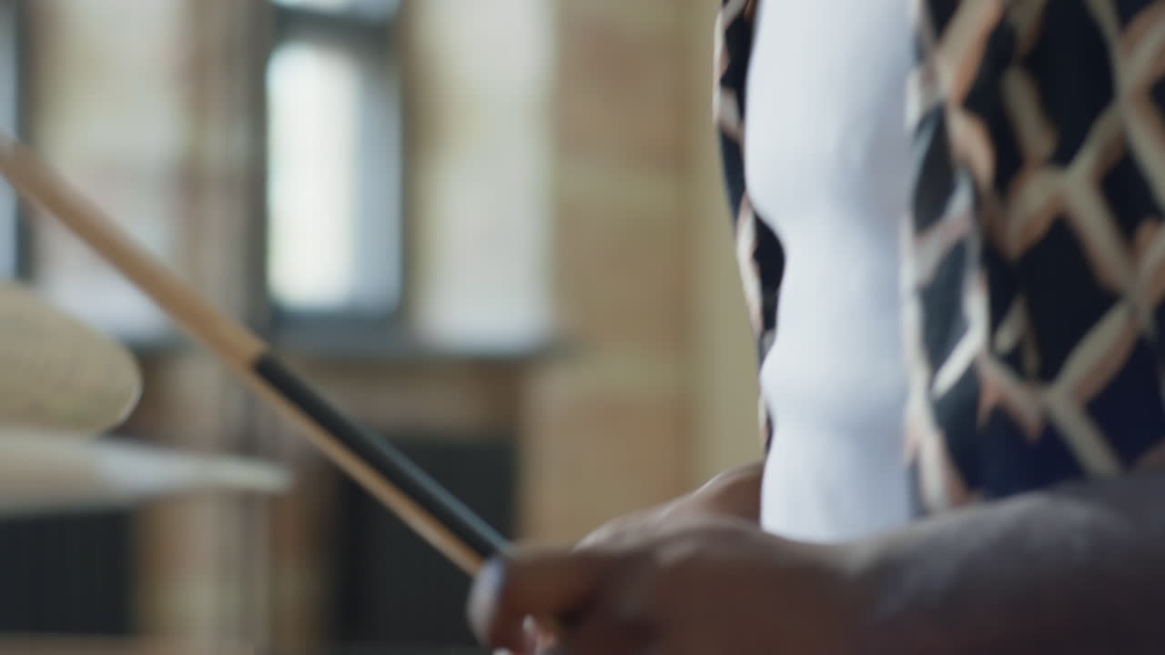 Close Up View of Black Drummer Playing Drums