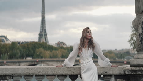 elegant woman in white dress in paris