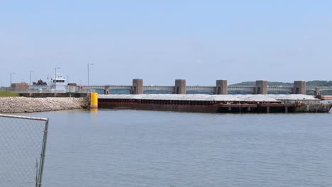 barge slowly moving through lock no