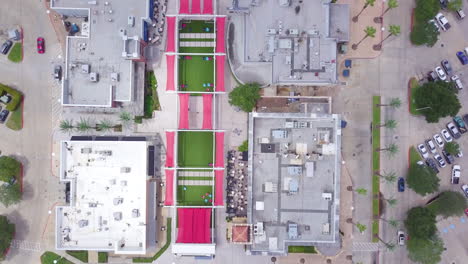 top down drone shot of the first colony mall in  sugar land city hall. aerial shot of the sugarland shopping city. colony mall from above