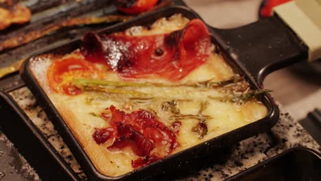 french swiss or spanish restaurant with traditional tapas food, spanish cuisine, delicious tapas and cheese plate, bruschetta with cheese, olives dry tomatoes and tasty sandwich bar appetizer, buffet