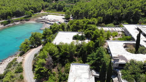 aerial drone shot of an old hotel in jelsa on the island of hvar, croatia