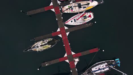 drone shot of a marina in the early morning near seattle looking down on the boats