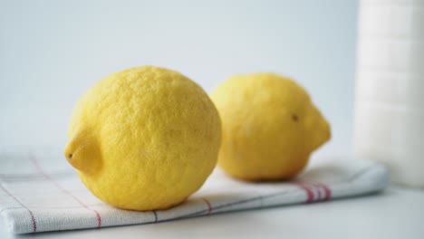 two lemons on a napkin