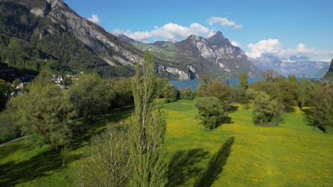 Aerial-arc-shot-of-Switzerland-showcasing-breathtaking-Alpine-landscape