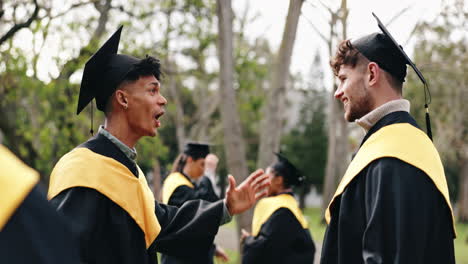 graduates hugging