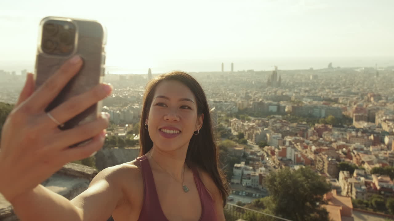 Woman taking a selfie in Barcelona